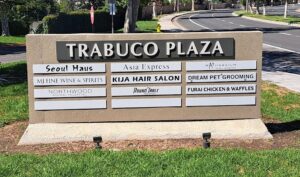 Monument sign restoration and new sign faces in orange county, ca