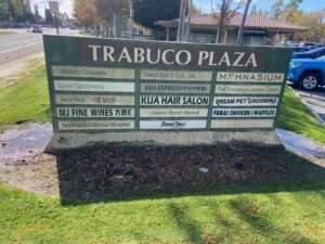 Old Monument sign before restoration in Orange County, CA