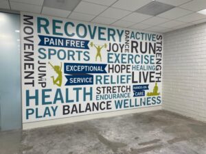 custom word wall wrap designs for physical therapy providers in orange county, ca